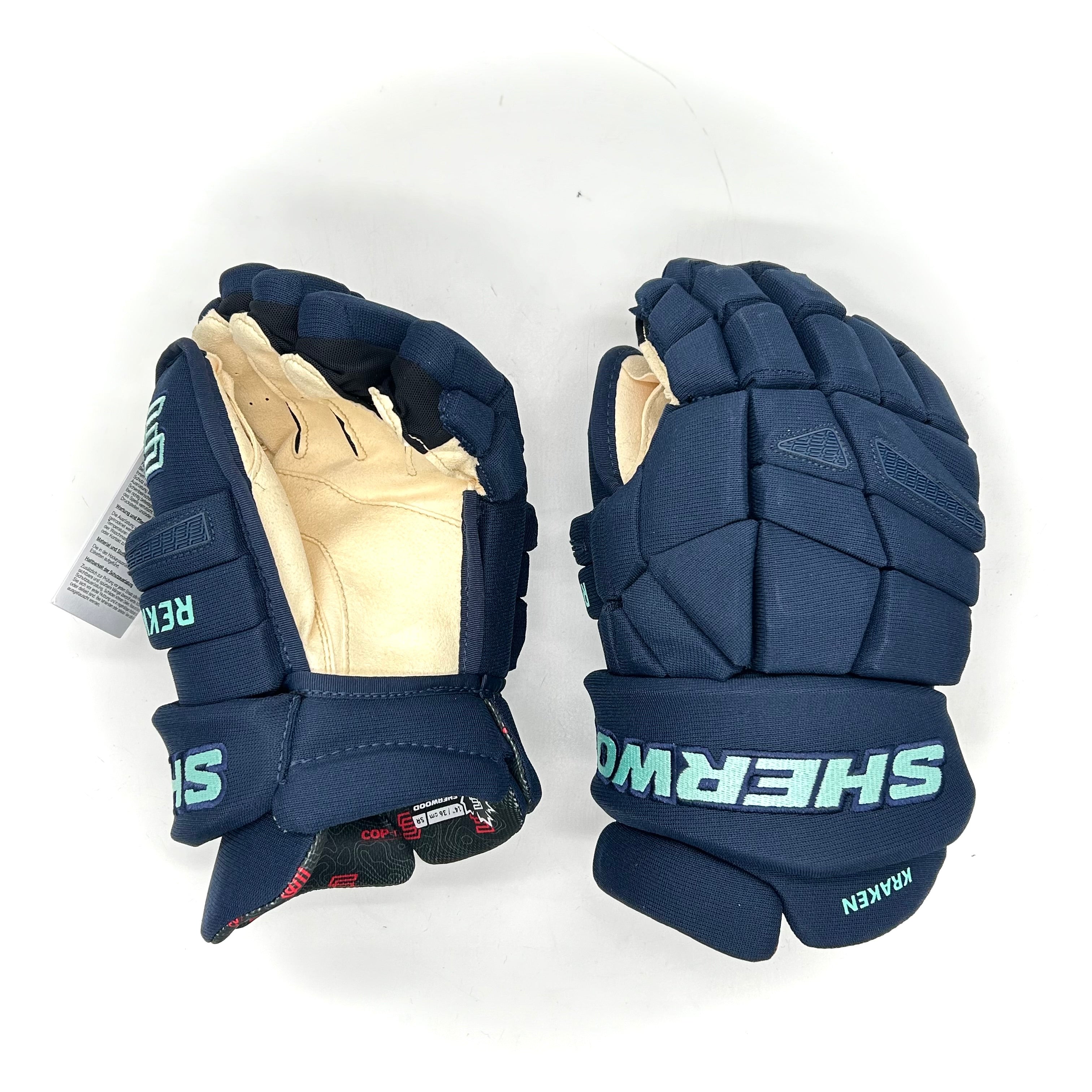 Gant Sherwood Rekker Legend Pro – NHL Pro Stock – Paume Pro – Seattle Kraken (bleu marine/bleu sarcelle)